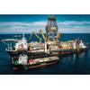 The four-kilometer airlift riser system installed upon the Hidden Gem is constructed from multiple sections of piping which must be sequentially lowered to the seafloor.
Image courtesy of TMC
